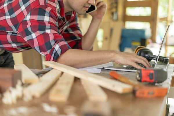asian-man-owner-a-small-furniture-business-is-recheck-order-online-carpenter-male-is-adjust-wood-to-the-desired-size-architect-designer-built-in-professional-wood-craftsman-workshop-photo asian-man-owner-a-small-furniture-business-is-recheck-order-online-carpenter-male-is-adjust-wood-to-the-desired-size-architect-designer-built-in-professional-wood-craftsman-workshop-photo