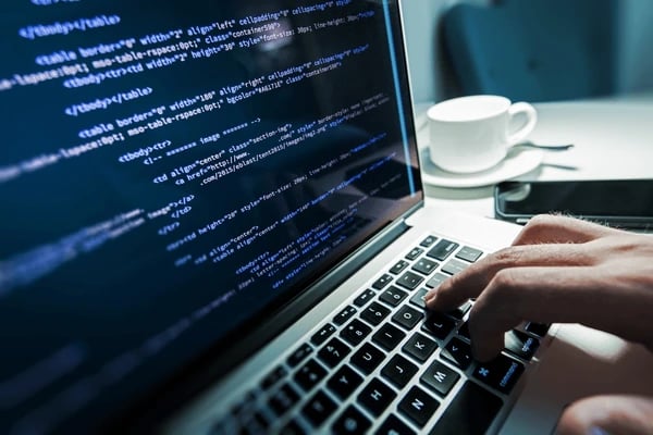 programming-work-time-programmer-typing-600nw-329205053